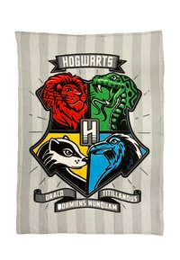 Fleece blanket featuring a Hogwarts crest with red lion, green serpent, yellow badger, and blue eagle, set against a gray striped background.