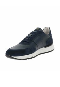 Zapatilla azul marino con parte superior de cuero suave y gamuza, entresuela blanca y suela negra; diseño de cordones con sutiles acentos de marca.