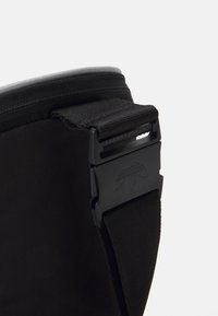 adidas Originals SMALL ITEM - Bum bag - black/reflective silver