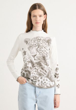 Langsleeve top in het wit met een gedetailleerde grijze luipaardprint. Golfkraag en manchetten; zachte, gestructureerde stof. Casual fit met een afgeronde zoom.
