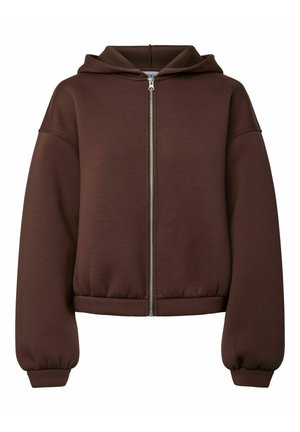 Smeđi dukserica na zip s teksturiranim materijalom. Ima kapuljaču, spuštene ramene i elastične manžete i rub za opušteni fit.