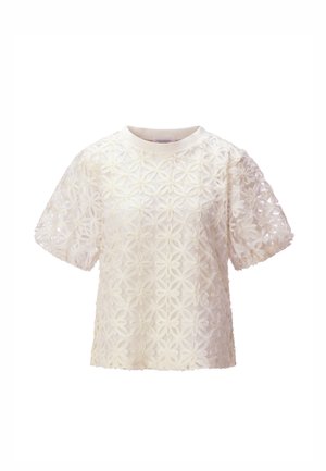 Fehér rövid ujjú blúz virágos csipke ráhajtással és kerek nyakkivágással, finom virágmintával, amely áttetsző hatást kölcsönöz a teljes anyagon.
