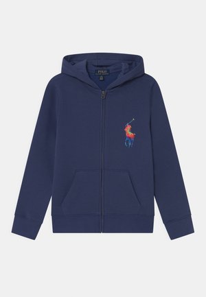 Sweat à capuche zippé bleu marine avec un logo Polo Ralph Lauren arc-en-ciel représentant un joueur de polo sur la poitrine gauche et des poches kangourou à l'avant.