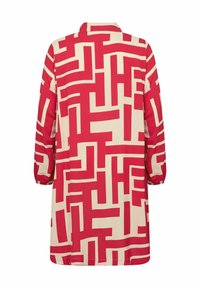 Punainen ja kerma vaaleanpunainen kuvioitu mekko, jossa on geometrinen muotoilu, pitkät hihat, kaulus sekä rento, suora leikkaus.