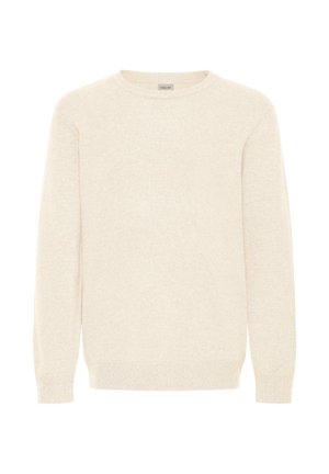 Kreemikaalune kootud sviiter, millel on pikad varrukad ja ümmargune kaelus, ribbidega mansetid ja äär.