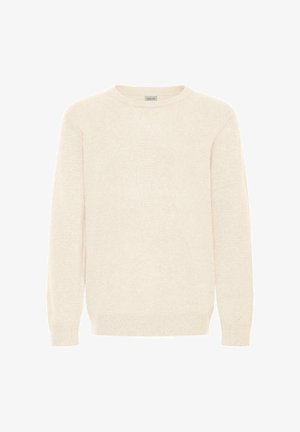 Kreemikaalune kootud sviiter, millel on pikad varrukad ja ümmargune kaelus, ribbidega mansetid ja äär.