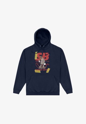 Sweat à capuche bleu marine avec poche frontale, arborant un graphisme coloré d'un personnage haut-parleur de dessin animé sur un skateboard et le texte "ISB Twenty Twenty Five Street Style".