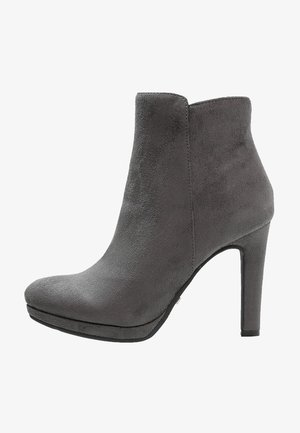 Gray suede ankle boot with a rounded toe, high stiletto heel, and a smooth texture. Simple design with no visible hardware or patterns.