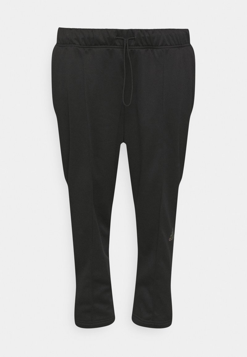 Pantalones deportivos negros con cintura elástica y cordón, piernas ajustadas y pequeño logo en la parte inferior de la pierna derecha.