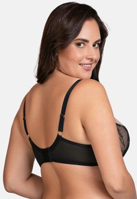 Black lace bra with a mesh back, adjustable straps featuring gold hardware, and a smooth band. The design emphasizes comfort and support.