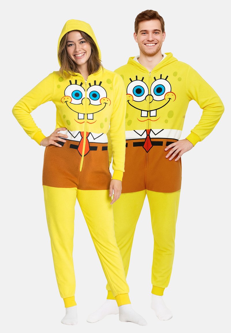 Pigiami in pile gialli con design di SpongeBob SquarePants, dotati di cappuccio, zipper frontale e sezione dei pantaloni in marrone a contrasto.