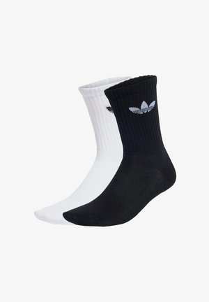 Μαύρες και άσπρες αθλητικές κάλτσες με ριβέ σχέδιο και κεντητό λογότυπο στον καρπό; μίγμα βαμβακιού, μήκους αστραγάλου, χωρίς ραφή στην κορυφή.