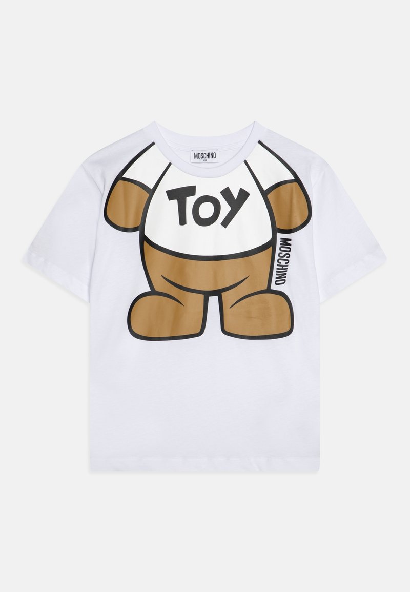 Biała bawełniana koszulka z krótkim rękawem z grafiką w postaci kreskówkowego misia o brązowym ciele i napisem "TOY" w kolorze czarnym z przodu. Okrągły dekolt.
