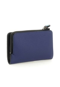 Portafoglio in pelle blu navy compatto con zip nera e alette della zip in turchese, mostrato chiuso su uno sfondo bianco.
