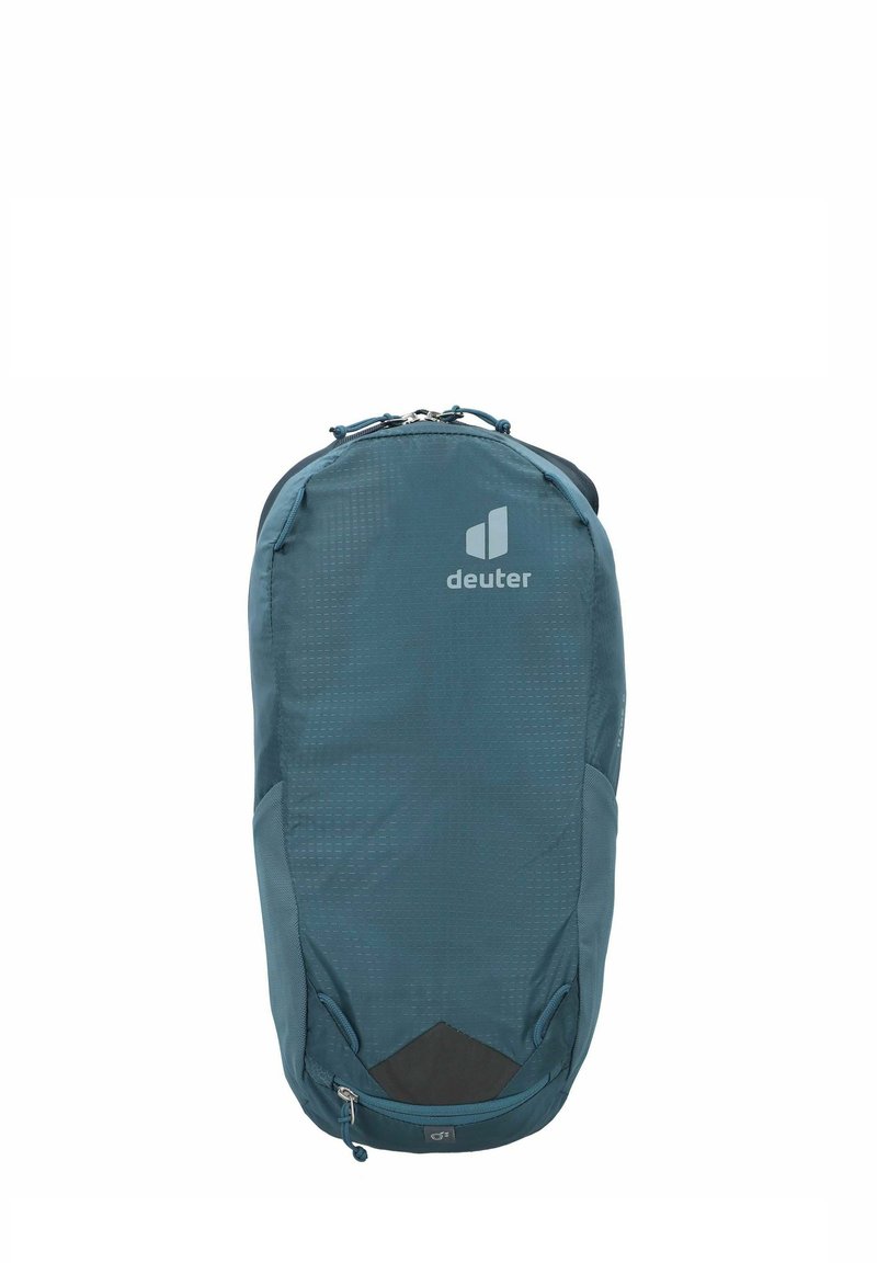 Zaino color turchese con un motivo geometrico, dotato di chiusura superiore con zip, tasca laterale e logo sul davanti. Realizzato in tessuto resistente con una forma snella.