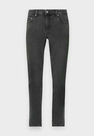 Tummanharmaat skinny-farkut, jotka on valmistettu denimistä ja joilla on sileä rakenne. Niissä on klassinen nappisulku ja perinteinen viisi taskua -design.