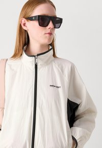 Calvin Klein Jeans RETRO TRACK JACKET - Training jacket - tofu