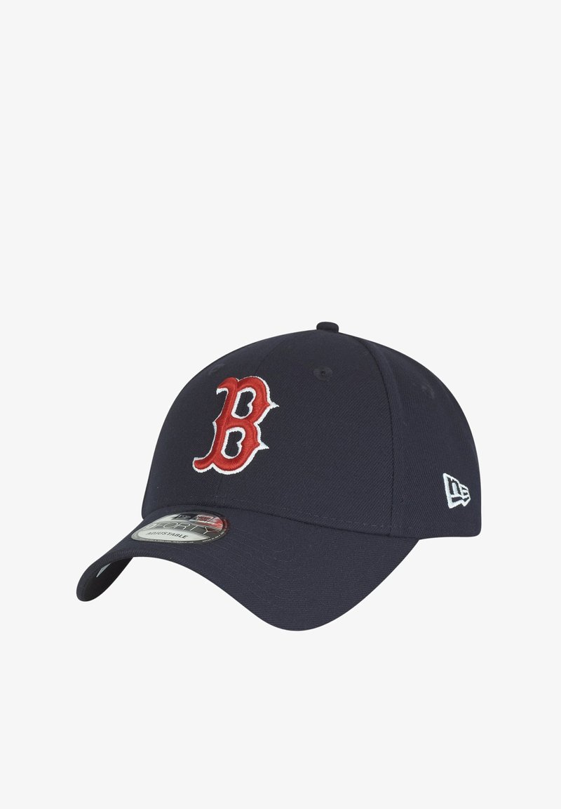 Navy baseball cap featuring a red embroidered 'B' logo on the front. Adjustable fit with a curved brim and textured fabric.