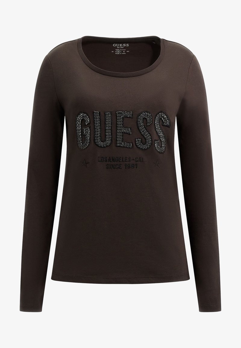 Langärmliges braunes Baumwoll-T-Shirt mit einem glitzernden schwarzen "GUESS"-Logo, rundem Ausschnitt und weichem Material.