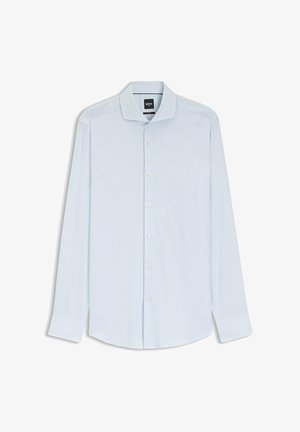 Camicia da uomo a maniche lunghe azzurro chiaro con chiusura frontale con bottoni e colletto classico, mostrata distesa su uno sfondo bianco.