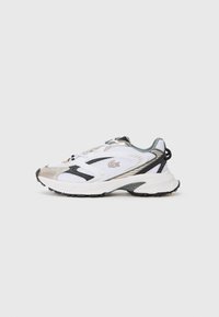 White athletic shoe with silver and black accents, mesh upper, textured sole, and a streamlined design featuring a logo on the side.