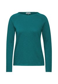 Tiffanysin vihreä pitkähihaine t-paita, jossa on pyöreä kaula-aukko, valmistettu tekstuurikankaasta, jossa on raglan-hihat eikä näkyviä kuvioita tai varusteita.