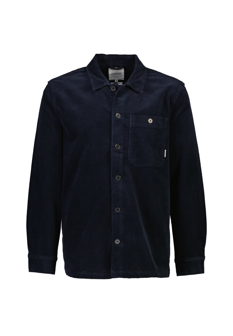 Granatowa koszula z sztruksu z długimi rękawami, z wyrazistym kołnierzykiem, z przodem na guziki i kieszenią na piersi. Subtelna tekstura i dopasowany krój.