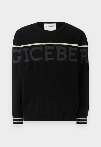 Pull en tricot noir avec un logo texturé "ICEBERG" sur la poitrine, accompagné d'accents rayés crème et noir sur les poignets et le col.
