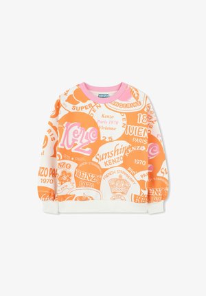 Sweatshirt Kenzo avec un design blanc et orange, agrémenté de textes ludiques et de motifs. Tissu doux, poignets côtelés et col rond.