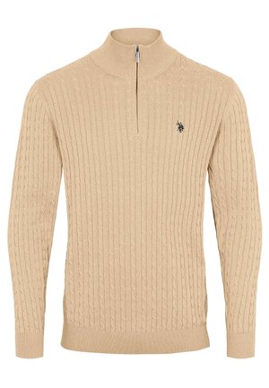 Beżowy sweter dziany z wzorem z warkoczy, wysokim kołnierzem z suwakiem na trzy czwarte oraz ściągaczami na mankietach i dole. Małe logo na klatce piersiowej.