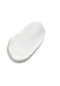 White cream or lotion spread in a smooth, curved shape with a slight sheen, featuring a soft, thick texture.