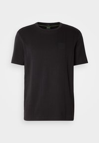 T-shirt noir à manches courtes avec col rond, coutures verticales discrètes et petite poche sur la poitrine gauche.