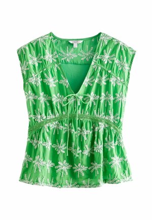 Grüne Bluse mit V-Ausschnitt und kurzen Ärmeln. Verziert mit weißer Blumenstickerei und einem Bindeband am Ausschnitt. Leichter, strukturierten Stoff.