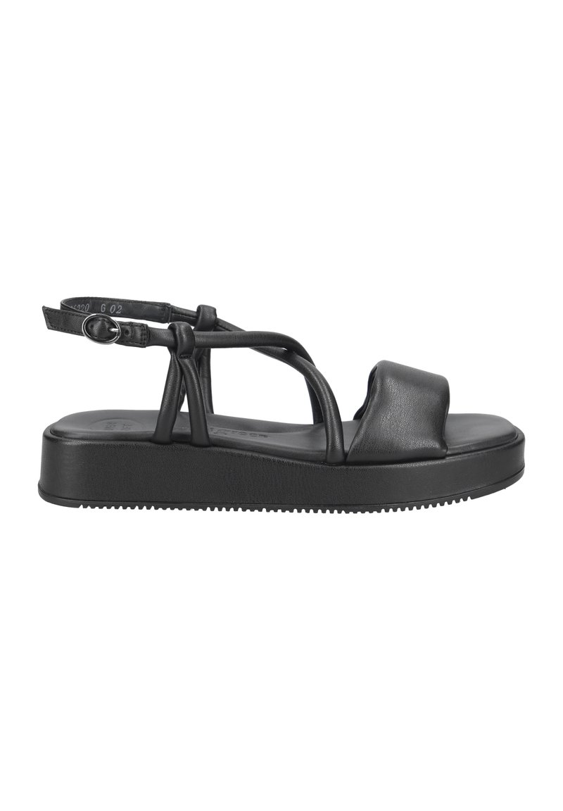 Černé kožené sandály s plochou podrážkou, širokými popruhy, smyčkou na prsty a přezkou na kotníku pro nastavitelné nošení. Hladký povrch a minimalistický design.