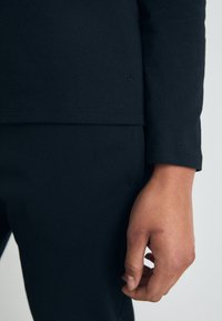 Triumph SET - Pyžamová sada - black