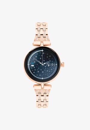 Montre en or rose avec un cadran rond, un face noir à motifs d'étoiles, des accents argentés et un bracelet à maillons orné de strass.