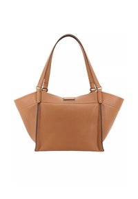 Tan leather tote bag with a wide, angular shape, smooth texture, double shoulder straps, and subtle black trim accents.