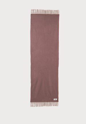 Écharpe rectangulaire mauve douce avec des bords à franges aux deux extrémités et une petite étiquette blanche dans un coin.
