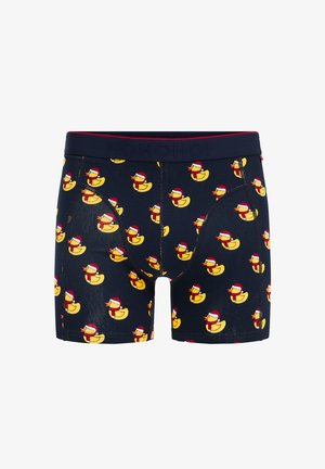 Marinefarbene Boxer-Shorts mit einem Muster von gelben Gummienten, die Weihnachtsmannmützen tragen. Ausgestattet mit einem dehnbaren Bund, auf dem der Text "HOHOHO!" steht.