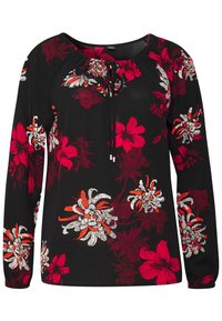 Blusa negra de manga larga con vibrante estampado floral en rojo y blanco. Presenta un cuello redondo con un detalle de lazo para un ajuste ajustable.