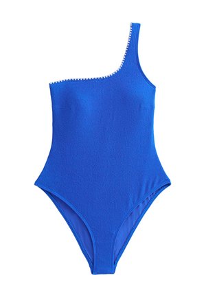 Eén-schouder, felblauwe badpak met textuurstof en contrasterende golvende rand langs de halslijn. Hoog uitgesneden benen.