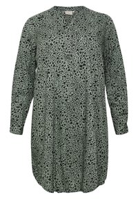 El vestido de túnica verde presenta un diseño de estampado de leopardo negro, mangas largas, un escote en V y un corte holgado con un dobladillo redondeado.