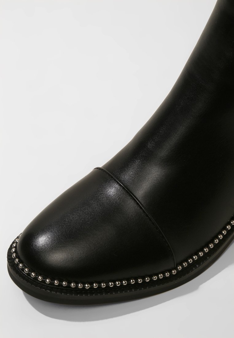 raid apple black studded chelsea boots