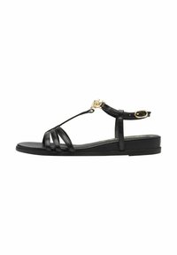 Black leather sandal with multiple narrow straps, a flat sole, and a gold-tone accent on the ankle strap. Adjustable buckle closure.