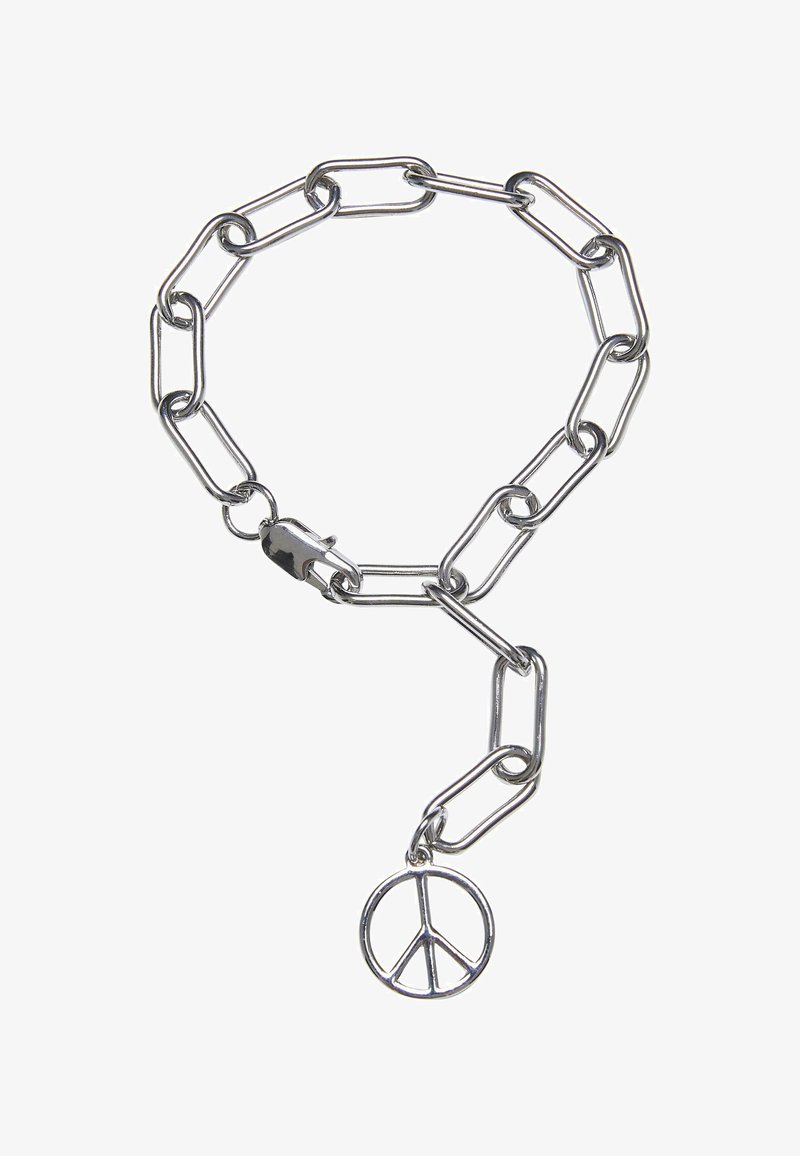Srebrn zapestnica s podaljšanimi povezavami in čarom miru, ki se ponaša s sijočim kovinskim zaključkom in varnim zapiranjem.