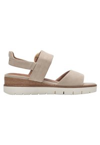 Sandale en daim beige avec une large lanière, bout ouvert et semelle en bois. Elle comporte un pied de botte texturé et rembourré ainsi qu'une lanière arrière ajustable.