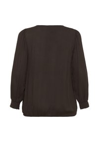 Mørkebrun langærmet bluse med puffede ærmer samt elastiske manchetter og nederste kant, vist fra bagsiden på en hvid baggrund.