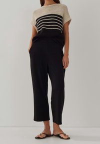 someday. Stickad tröja - black