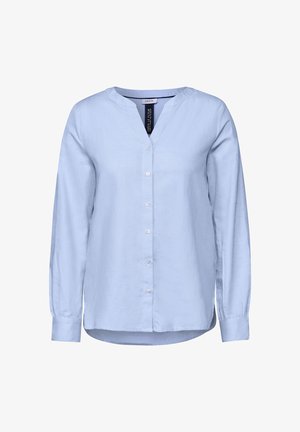 Camicia a maniche lunghe azzurro chiaro con scollo a V, chiusura con bottoni e orlo arrotondato. Realizzata in un tessuto morbido con una trama uniforme e un leggero lucido.