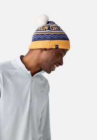 Brooks HERITAGE POM - Megzta kepurė - chamois fun to run